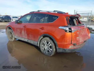 2016 Toyota RAV4 LE with VIN JTMBFREVXGJ081156, listed as a IAAI auction lot 41648303 with 74,087 mi miles. Bid and sale history available at carsss.com. Image 3.