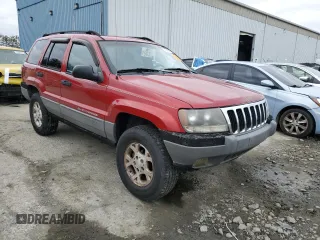 2002 Jeep Grand Cherokee with VIN 1J8GX38S92C176329, listed as a Copart auction lot 47885635 with 154,167 mi miles and Salvage title. Bid and sale history available at DreamBid. Image 4.