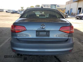 2015 Volkswagen Jetta SE z VIN 3VWD17AJ0FM293139, wystawiony jako Copart lot #61503405 z przebiegiem 100 045 mil mil oraz Czysty tytuł • Clean title. Historia ofert i sprzedaży dostępna na DreamBid. Obrazek 6.