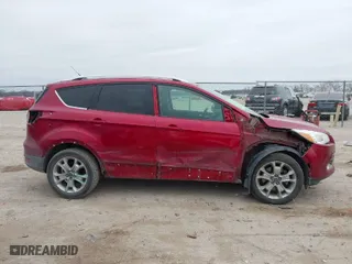 2015 Ford Escape Titanium with VIN 1FMCU0J90FUB93018, listed as a IAAI auction lot 41646313 with 150,711 mi miles. Bid and sale history available at carsss.com. Image 14.