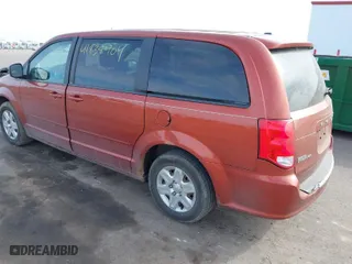 2012 Dodge Grand Caravan SE with VIN 2C4RDGBGXCR218097, listed as a IAAI auction lot 41838404 with 217,056 mi miles. Bid and sale history available at carsss.com. Image 3.