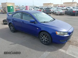 2008 Mitsubishi Lancer DE with VIN JA3AU26U68U037989, listed as a IAAI auction lot 41439261 with 153,927 mi miles. Bid and sale history available at carsss.com. Image 1.
