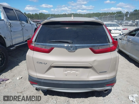 2018 Honda CR-V Touring with VIN 5J6RW1H98JL000031, listed as a IAAI auction lot 40605651 with 129,516 mi miles and . Bid and sale history available at DreamBid. Image 15.