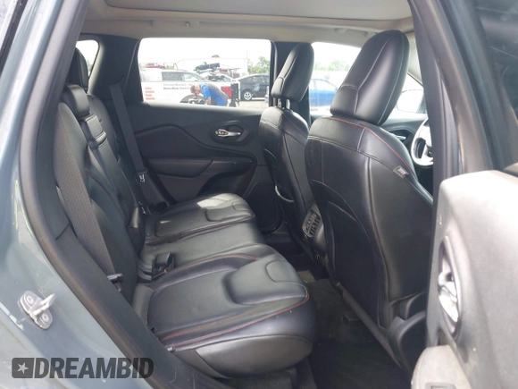 2014 Jeep Cherokee Trailhawk z VIN 1C4PJMBS4EW236950, wystawiony jako IAAI lot #42636128 z przebiegiem 170 491 mil mil oraz . Historia ofert i sprzedaży dostępna na DreamBid. Obrazek 8.