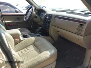 2001 Jeep Grand Cherokee Limited with VIN 1J4GW58N51C575036, listed as a IAAI auction lot 42573849 with 223,757 mi miles and . Bid and sale history available at DreamBid. Image 5.