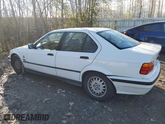 1995 BMW 3 Series 325i with VIN WBACB4326SFM22346, listed as a Copart auction lot 79960304 with 71,071 mi miles and Salvage Title. Bid and sale history available at carsss.com. Image 2.
