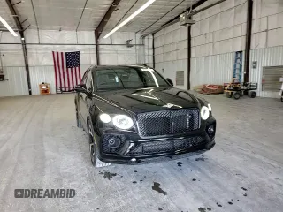 2022 Bentley Bentayga V8 z VIN SJAAM2ZV8NC039607, wystawiony jako Copart lot #54888564 z przebiegiem 15 561 mil mil oraz . Historia ofert i sprzedaży dostępna na DreamBid. Obrazek 11.