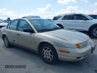 2002 Saturn SL with VIN 1G8ZK54732Z132538, listed as a IAAI auction lot 42560758 with 240,734 mi miles and . Bid and sale history available at DreamBid. Image 1.
