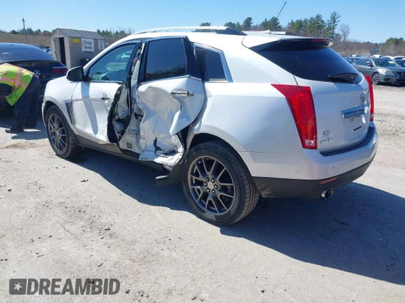 2013 Cadillac SRX Performance Collection with VIN 3GYFNDE33DS637155, listed as a IAAI auction lot 41977706 with 140,668 mi miles and . Bid and sale history available at DreamBid. Image 3.