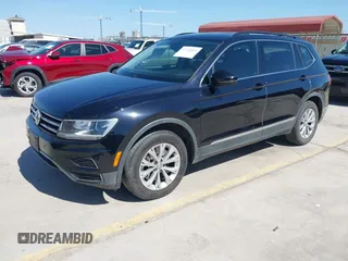 2018 Volkswagen Tiguan SEL with VIN 3VV3B7AX3JM064061, listed as a IAAI auction lot 41772564 with 95,395 mi miles and . Bid and sale history available at DreamBid. Image 2.