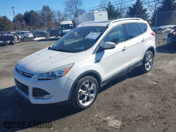 2016 Ford Escape Titanium with VIN 1FMCU9J96GUB65441, listed as a IAAI auction lot 41412223 with 74,218 mi miles. Bid and sale history available at carsss.com. Image 17.