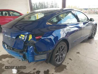 2022 Tesla Model 3 Long Range with VIN 5YJ3E1EB3NF267365, listed as a IAAI auction lot 41996594 with 32,687 mi miles and . Bid and sale history available at DreamBid. Image 4.