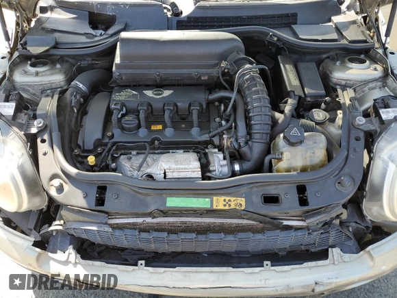 2009 MINI Hardtop S with VIN WMWMF73549TT94143, listed as a Copart auction lot 52120615 with 144,334 mi miles and Salvage Title. Bid and sale history available at DreamBid. Image 11.