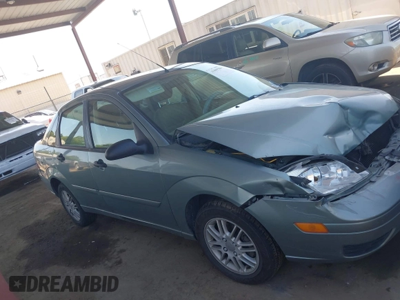 2005 Ford Focus S with VIN 1FAFP34N05W276945, listed as a IAAI auction lot 41889586 with 253,219 mi miles. Bid and sale history available at carsss.com. Image 13.