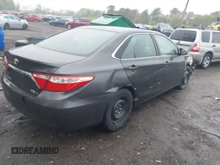 2015 Toyota Camry LE with VIN 4T1BD1FK8FU159177, listed as a IAAI auction lot 42149932 with 387,046 mi miles and . Bid and sale history available at DreamBid. Image 4.