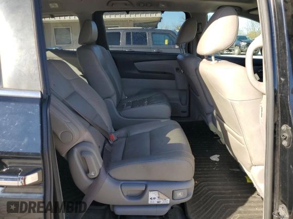 2014 Honda Odyssey EX-L with VIN 5FNRL5H69EB121140, listed as a Copart auction lot 79698724 with 169,626 mi miles and Salvage Title. Bid and sale history available at DreamBid. Image 11.