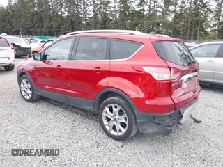 2014 Ford Escape Titanium with VIN 1FMCU9J9XEUD71715, listed as a IAAI auction lot 42127982 with 96,549 mi miles and . Bid and sale history available at DreamBid. Image 3.