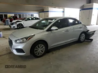 2022 Hyundai Accent SE z VIN 3KPC24A61NE171582, wystawiony jako Copart lot #57715085 z przebiegiem 21 392 mil mil oraz Szkoda całkowita • Salvage title. Historia ofert i sprzedaży dostępna na DreamBid. Obrazek 1.
