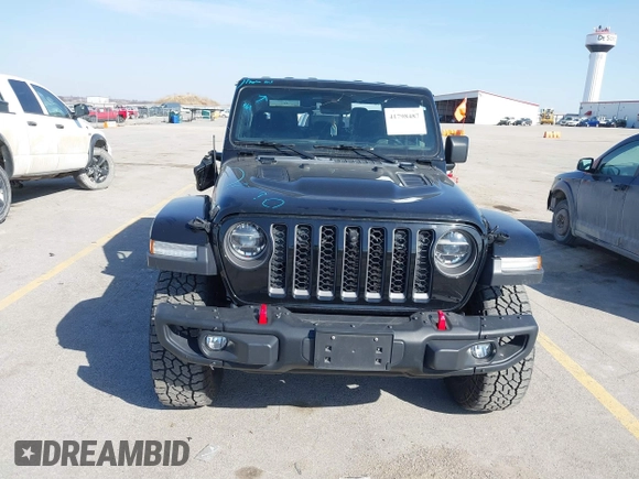 2020 Jeep Gladiator Rubicon with VIN 1C6JJTBG9LL152141, listed as a IAAI auction lot 41798487 with 78,585 mi miles and . Bid and sale history available at DreamBid. Image 12.