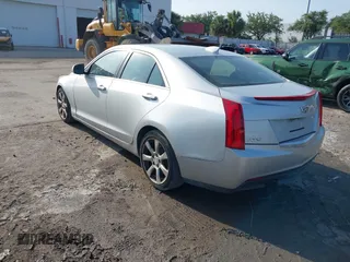 2015 Cadillac ATS Luxury RWD z VIN 1G6AB5RA6F0127029, wystawiony jako IAAI lot #42376359 z przebiegiem 131 823 mil mil oraz . Historia ofert i sprzedaży dostępna na DreamBid. Obrazek 3.