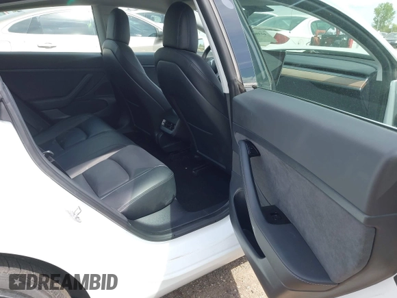 2020 Tesla Model 3 Standard Range Plus z VIN 5YJ3E1EA3LF794276, wystawiony jako IAAI lot #42390409 z przebiegiem 51 924 mil mil oraz . Historia ofert i sprzedaży dostępna na DreamBid. Obrazek 8.
