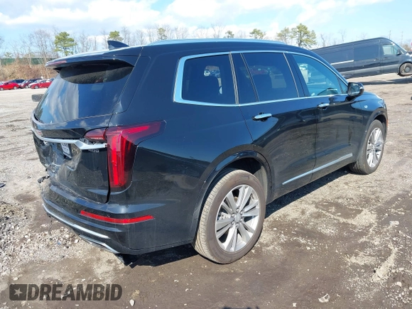 2023 Cadillac XT6 AWD Premium Luxury with VIN 1GYKPDRS8PZ153838, listed as a IAAI auction lot 41838527 with 60,034 mi miles and . Bid and sale history available at DreamBid. Image 4.