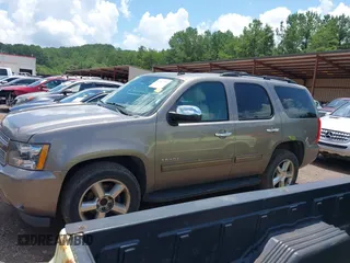 2012 Chevrolet Tahoe LT with VIN 1GNSCBE09CR229417, listed as a IAAI auction lot 42507793 with 164,877 mi miles and . Bid and sale history available at DreamBid. Image 14.
