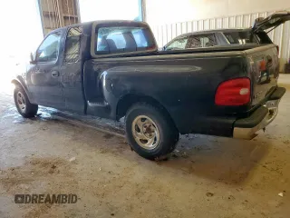 1998 Ford F-150 XL with VIN 1FTZX0725WKB83760, listed as a Copart auction lot 60988225 with 243,361 mi miles and Salvage title. Bid and sale history available at DreamBid. Image 2.