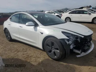 2023 Tesla Model 3 with VIN 5YJ3E1EA9PF546149, listed as a Copart auction lot 52104365 with 34,105 mi miles and Salvage Title. Bid and sale history available at DreamBid. Image 4.