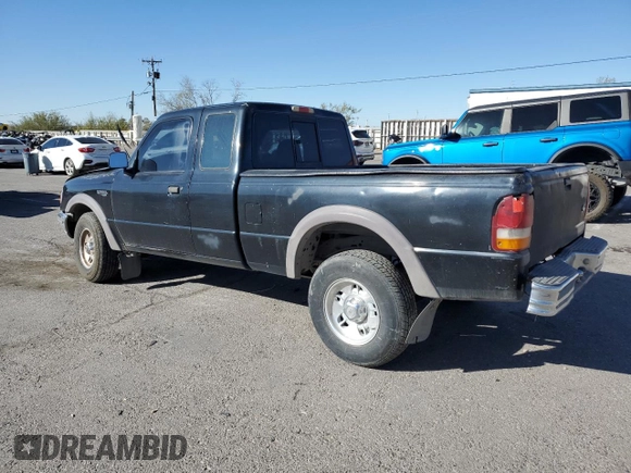 1997 Ford Ranger XLT with VIN 1FTCR15X2VPA50685, listed as a Copart auction lot 81790574 with 128,458 mi miles and Salvage Title. Bid and sale history available at DreamBid. Image 2.