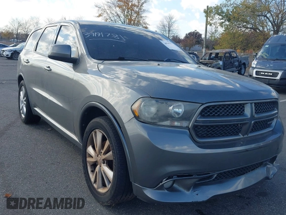 2011 Dodge Durango Heat with VIN 1D4RE3GG8BC733088, listed as a IAAI auction lot 40764161 with 149,846 mi miles. Bid and sale history available at carsss.com. Image 1.