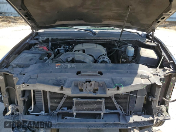 2014 Chevrolet Tahoe LT with VIN 1GNSCBE07ER115998, listed as a Copart auction lot 59577485 with 154,486 mi miles and Salvage title. Bid and sale history available at DreamBid. Image 12.