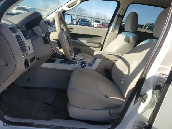 2009 Mercury Mariner with VIN 4M2CU91G59KJ04643, listed as a Copart auction lot 83606594 with 257,218 mi miles and Salvage Title. Bid and sale history available at carsss.com. Image 7.