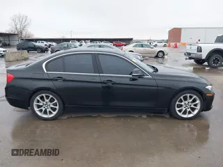2015 BMW 3 Series 320i with VIN WBA3B1G5XFNT02032, listed as a IAAI auction lot 41581535 with 170,114 mi miles. Bid and sale history available at carsss.com. Image 13.