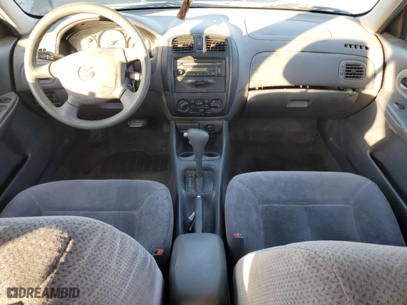 2000 Mazda Protege DX with VIN JM1BJ2229Y0266452, listed as a Copart auction lot 74366754 with 209,722 mi miles and Salvage Title. Bid and sale history available at carsss.com. Image 8.