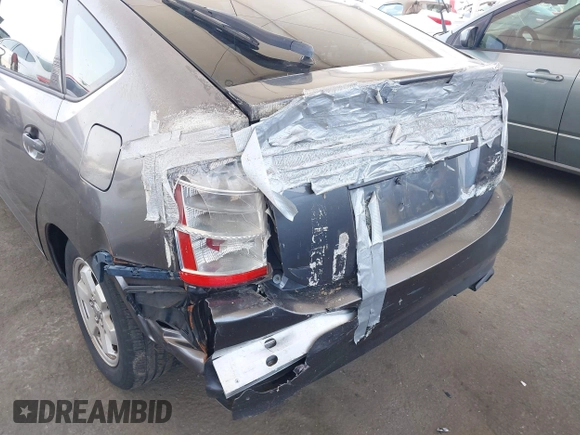 2007 Toyota Prius z VIN JTDKB20UX73281542, wystawiony jako IAAI lot #42449989 z przebiegiem 164 111 mil mil oraz . Historia ofert i sprzedaży dostępna na DreamBid. Obrazek 6.