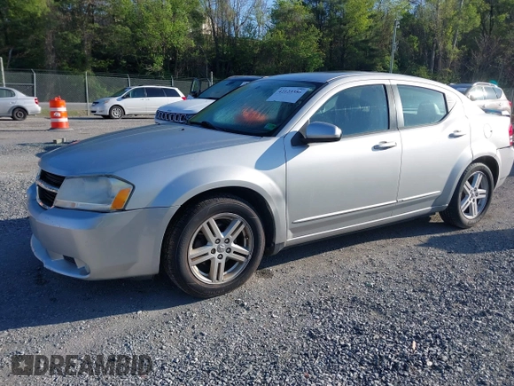 2010 Dodge Avenger R/T with VIN 1B3CC5FB2AN234415, listed as a IAAI auction lot 42123386 with 145,560 mi miles and . Bid and sale history available at DreamBid. Image 2.