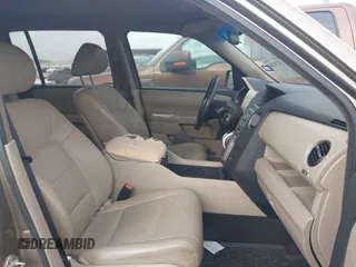 2011 Honda Pilot LX with VIN 5FNYF3H2XBB045721, listed as a IAAI auction lot 42791364 with 149,258 mi miles and . Bid and sale history available at DreamBid. Image 5.