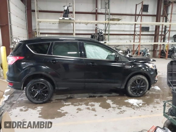2018 Ford Escape SE with VIN 1FMCU9GD7JUD36295, listed as a IAAI auction lot 41855037 with 85,305 mi miles. Bid and sale history available at carsss.com. Image 13.