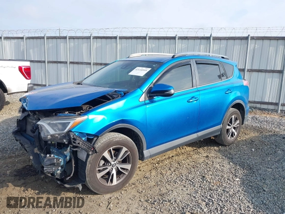 2018 Toyota RAV4 XLE with VIN JTMWFREV3JJ725847, listed as a IAAI auction lot 42110555 with 84,503 mi miles and . Bid and sale history available at DreamBid. Image 6.