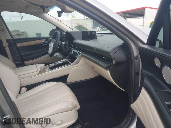 2021 Genesis GV80 with VIN KMUHCESC7MU038058, listed as a IAAI auction lot 42452578 with 63,980 mi miles and . Bid and sale history available at DreamBid. Image 5.
