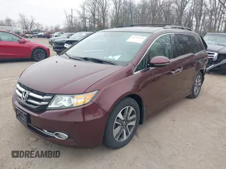 2014 Honda Odyssey Touring with VIN 5FNRL5H97EB117971, listed as a IAAI auction lot 41794324 with 198,191 mi miles and . Bid and sale history available at DreamBid. Image 17.