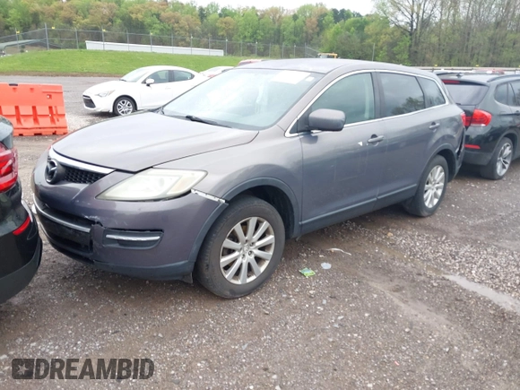 2008 Mazda CX-9 Sport with VIN JM3TB28A180144756, listed as a IAAI auction lot 41965396 with 309,077 mi miles and . Bid and sale history available at DreamBid. Image 2.