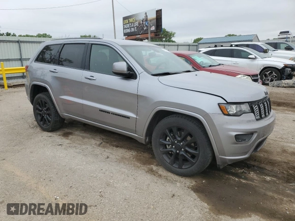 2021 Jeep Grand Cherokee Laredo X with VIN 1C4RJFAG6MC701505, listed as a Copart auction lot 54312755 with 79,519 mi miles and Salvage title. Bid and sale history available at DreamBid. Image 4.