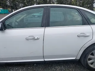 2008 Ford Taurus Limited with VIN 1FAHP25W98G158112, listed as a IAAI auction lot 41992172 with 300,719 mi miles. Bid and sale history available at carsss.com. Image 14.