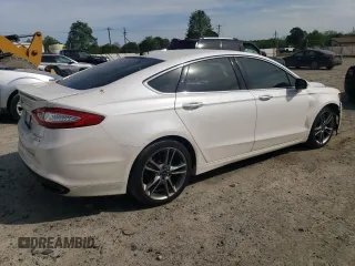 2014 Ford Fusion Titanium с VIN 3FA6P0K99ER290334, выставлен на аукционе Copart как лот 54534895 с пробегом 210 149 миль миль и Списание • Salvage title. История ставок и продаж доступна на DreamBid. Изображение 3.