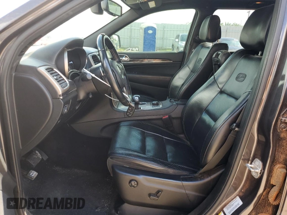 2015 Jeep Grand Cherokee Overland with VIN 1C4RJFCT4FC813510, listed as a Copart auction lot 41466395 with 135,124 mi miles and Salvage Title. Bid and sale history available at carsss.com. Image 7.