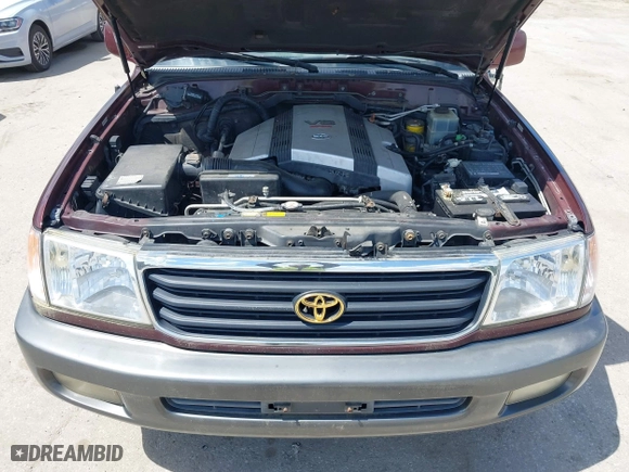 2002 Toyota Land Cruiser with VIN JTEHT05J422022565, listed as a IAAI auction lot 42042565 with 550,000 mi miles. Bid and sale history available at carsss.com. Image 10.