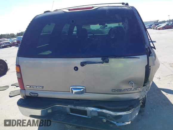 2001 Chevrolet Tahoe LS z VIN 1GNEC13T21J303213, wystawiony jako IAAI lot #41363563 z przebiegiem 194 243 mil mil oraz . Historia ofert i sprzedaży dostępna na DreamBid. Obrazek 16.