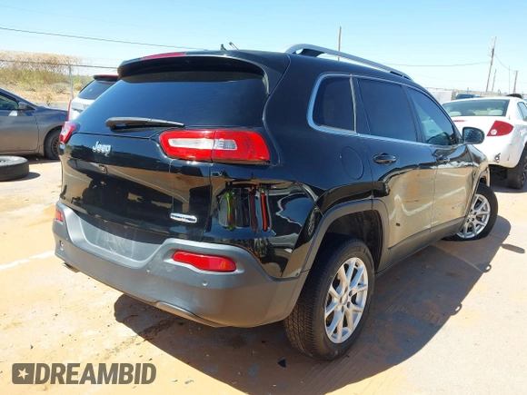 2017 Jeep Cherokee Latitude with VIN 1C4PJLCB4HW586821, listed as a IAAI auction lot 42041642 with 94,161 mi miles and . Bid and sale history available at DreamBid. Image 4.